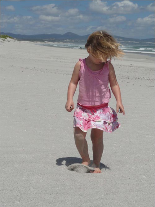Girl playing on Langezandt beach
